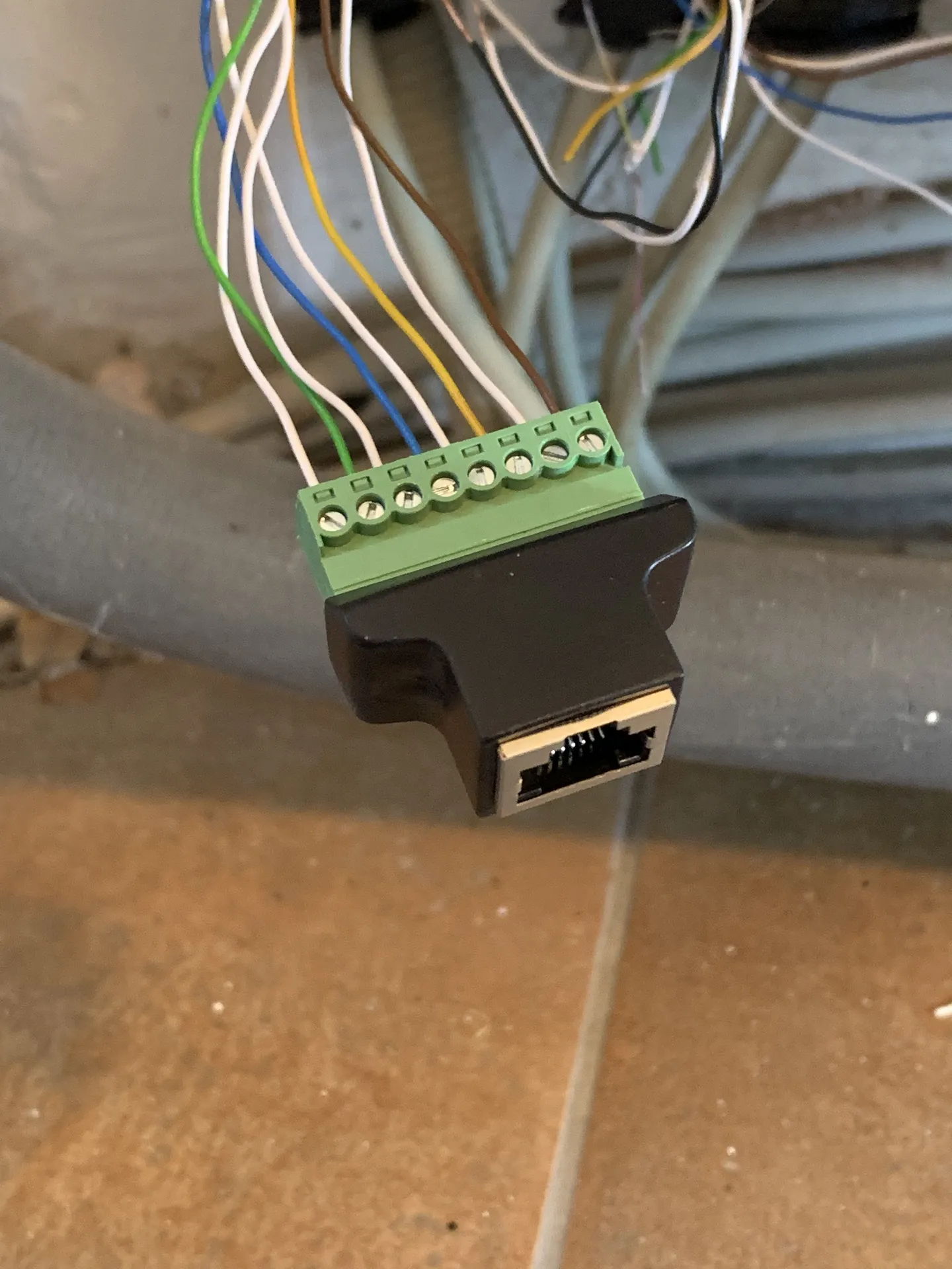 Test adapter mounted in junction box